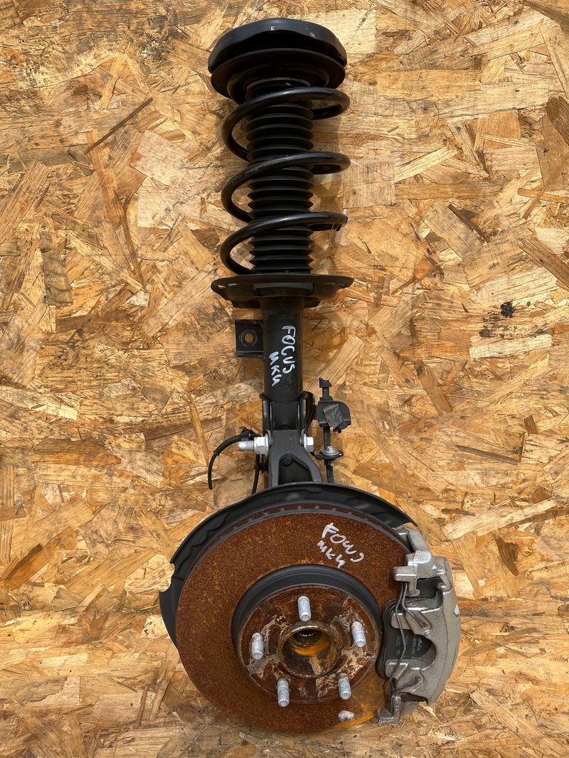 FORD FOCUS MK4 MCPHERSON ZWROTNICA AMORTYZATOR PRAWY PRZÓD