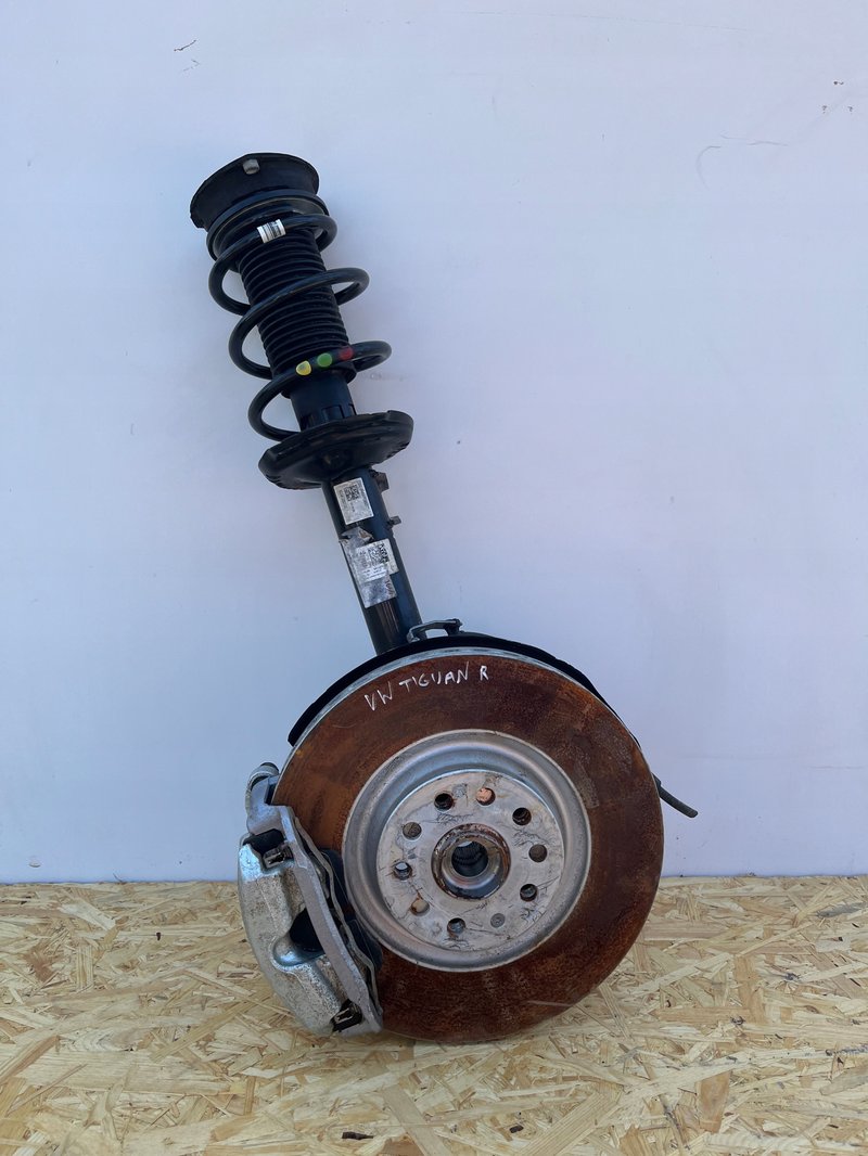 VW TIGUAN III ZWROTNICA MCPHERSON AMORTYZATOR PRAWY