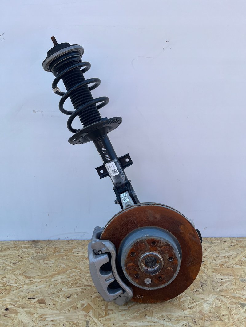 VW MULTIVAN T7 MCPHERSON ZWROTNICA AMORTYZATOR LEWY 7T0407253A