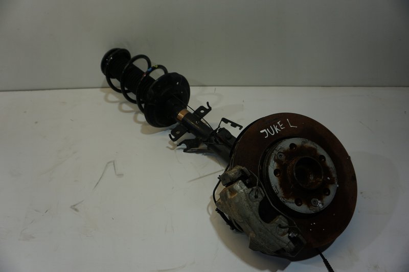 NISSAN JUKE F16 ZWROTNICA MCPHERSON AMORTYZATOR