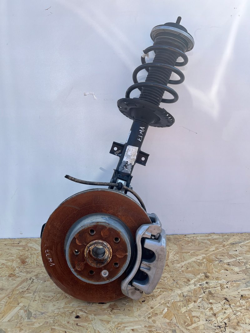 VW MULTIVAN T7 MCPHERSON ZWROTNICA AMORTYZATOR PRAWY 7T0407254A