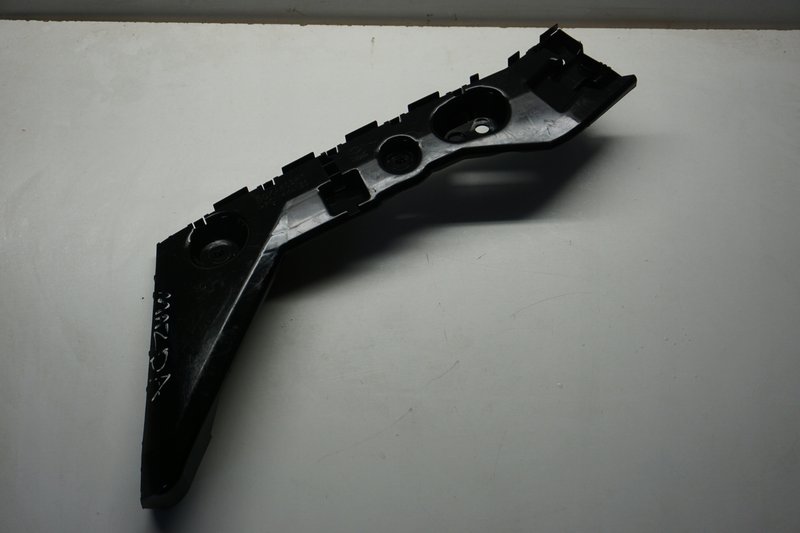 MAZDA 3 IV ŚLIZG ZDERZAKA BŁOTNIKA BCKA502H1