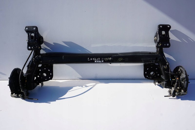HYUNDAI KONA BELKA OŚ TYLNA ZAWIESZENIE 55100-j9000