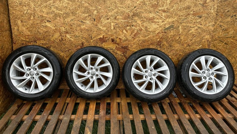 OPEL ASTRA J K FELGI ALUMINIOWE KOŁA OPONY 7Jx16 5x105 ET41 205/55